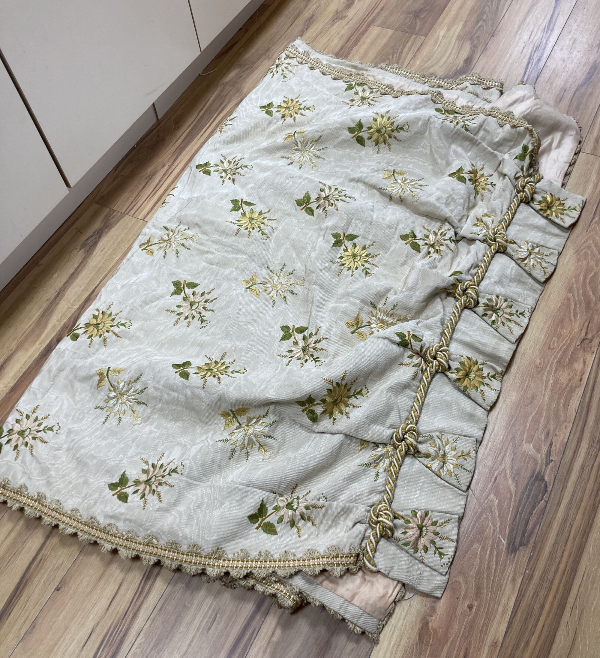 An Edwardian embroidered silk single curtain, 90cm wide at the top x 288cm long